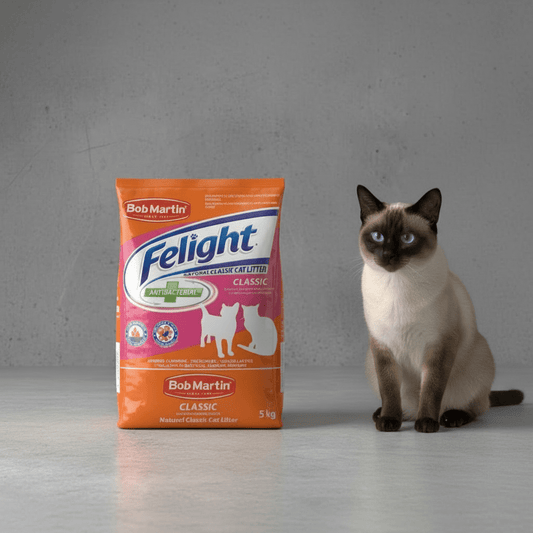 Bob Martin Felight classic natural cat litter bag with cat beside it, 5 kg