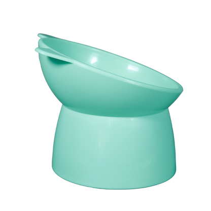 Green  elevated plastic cat bowl side view. 