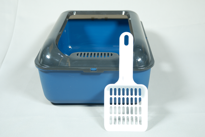 Blue cat litter box with a white scoop on a white background