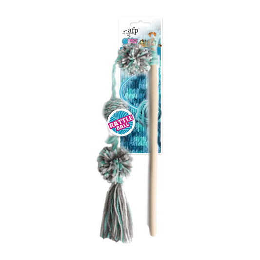 Cat toy wand with yarn pom-poms on blue backing card, white handle
