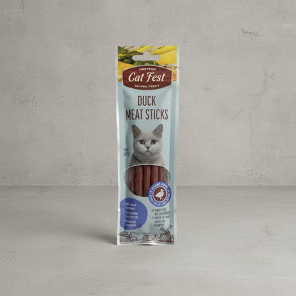 Package of Cat Fest Duck Meat Sticks on a greysurface 
