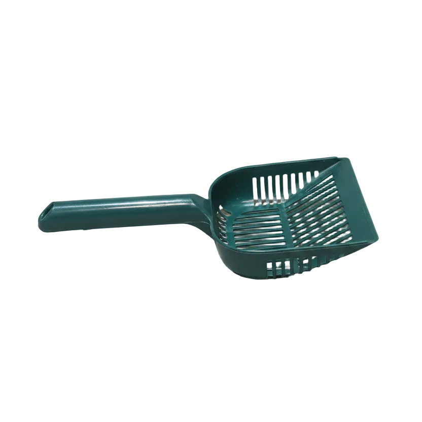 Green plastic scoop for cat litter