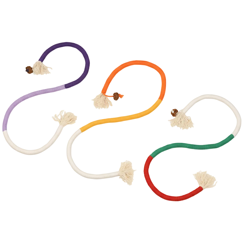 Colorful cat chew toys on a yellow background with text about cat chewing fun.