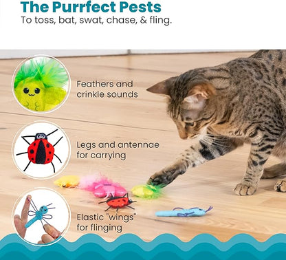 Cat playing with 'Purrfect Pests' toys on a wooden floor.
