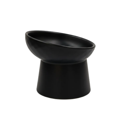black tilted ceramic cat bowl with elevated base

elevated ceramic pet bowl with slanted design for cats

tilted raised ceramic cat food bowl with kibble

modern black ceramic cat water and food bowl