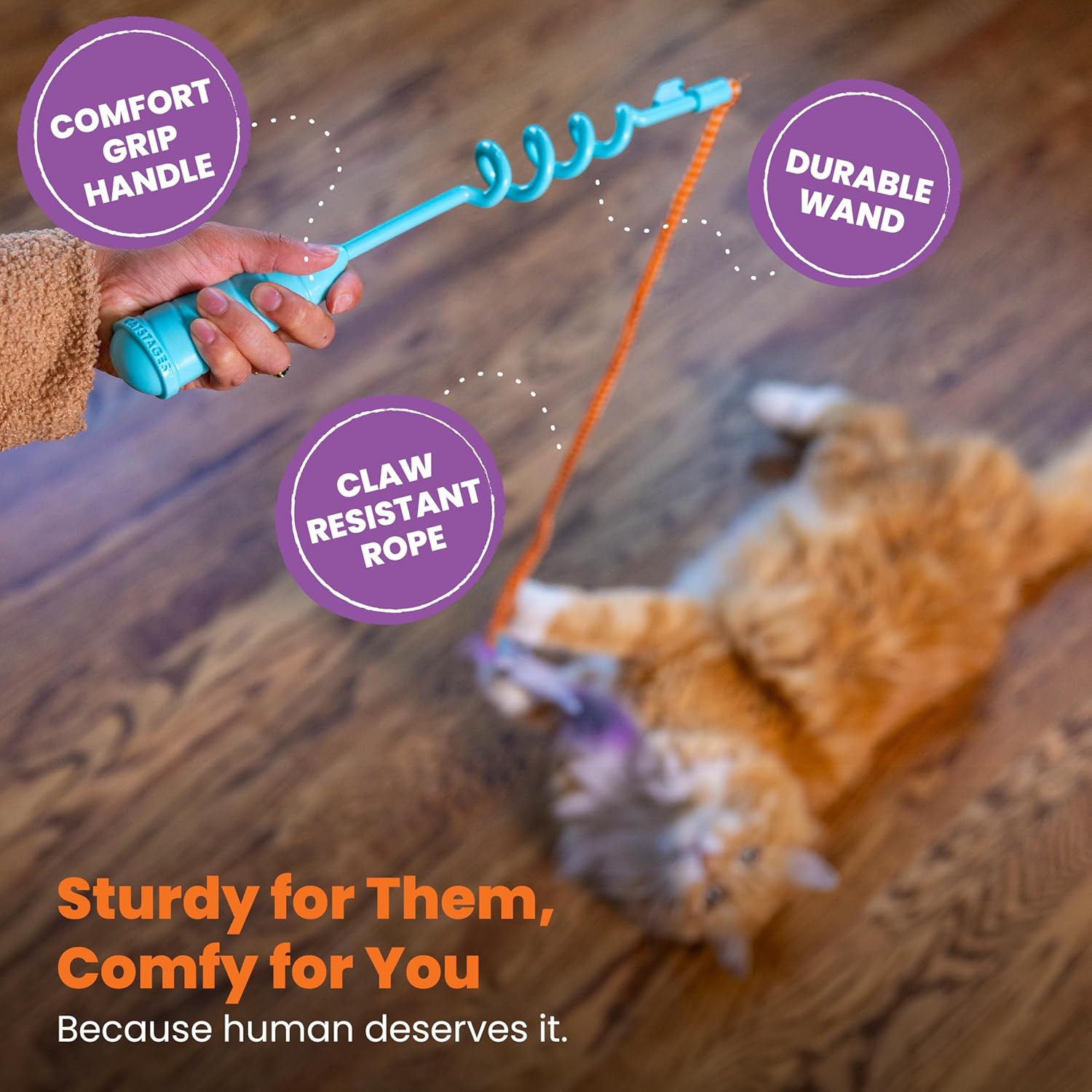 Cat toy with a hand holding a blue handle, featuring text on durability and comfort.