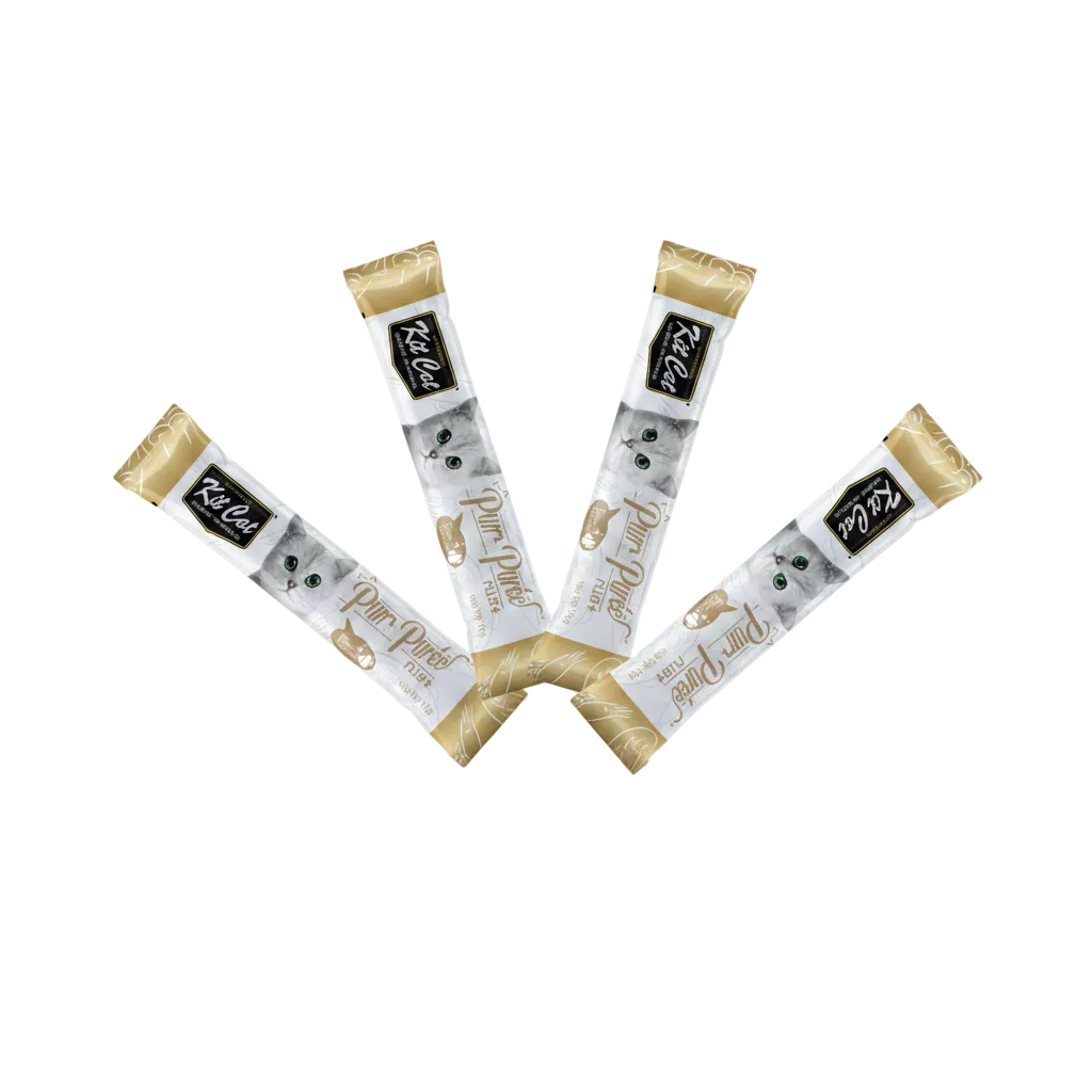 Four Kit Cat purr puree treat packages with a cat illustration on a white background