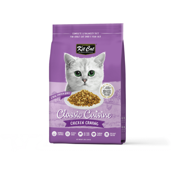Purple dry cat food pouch with Kit Cat logo and classic cuisine chicken crumbles graphic