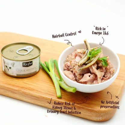 Kit Cat Tuna and Anchovy wet cat food served in a bowl beside the can