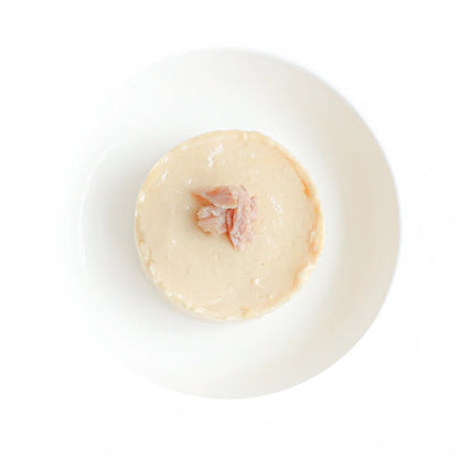Close-up of Kit Cat Chicken Mousse with Tuna Topper showing its smooth, creamy texture.