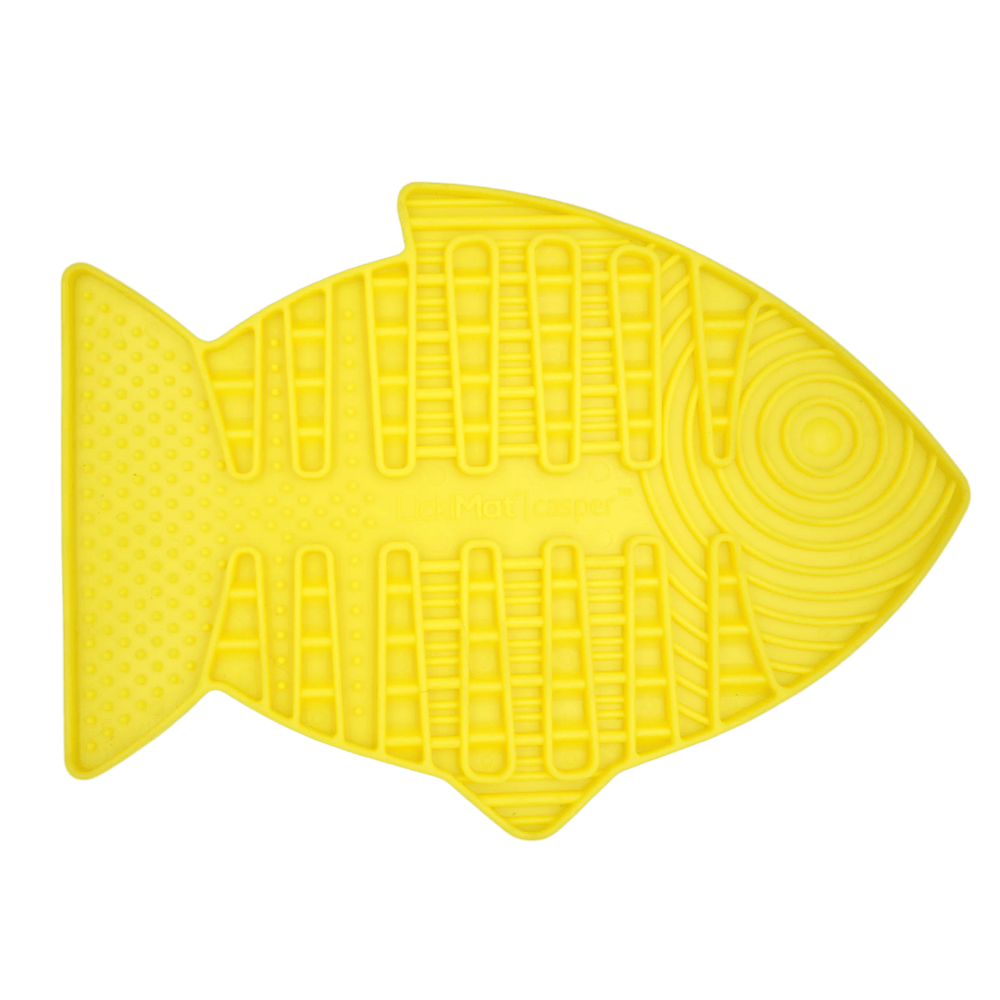 Yellow fish-shaped slow feeder mat with raised lick channels for cats