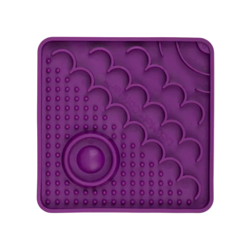 Purple LickiMat Catster slow feeder for cats with textured enrichment feeding surface and hydration well.