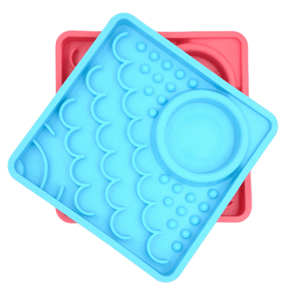 LickiMat® Kitty slow feeder set: blue tray over pink tray with raised lick nubs and dish