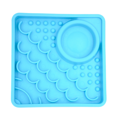 LickiMat® Kitty slow feeder for kittens in turquoise blue, with raised lick nubs and dish