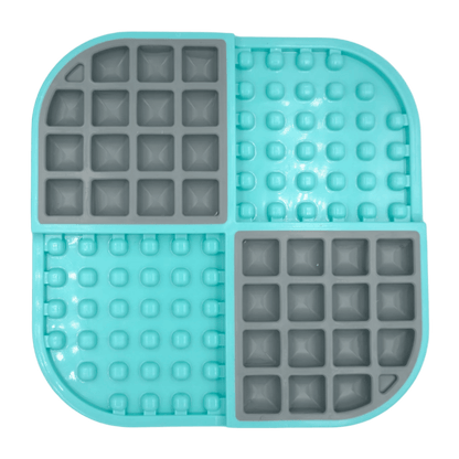Slow feeder cat feeding mat with turquoise silicone and gray puzzle sections
