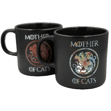 Pair of black Mother of Cats mugs, one floral cat wreath and one red cat emblem