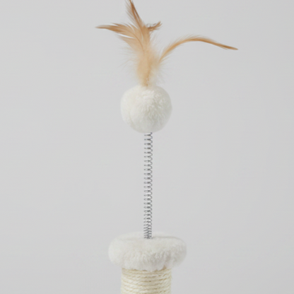 Close-up of feather pom-pom toy on M-PETS Kitten Feather Cat Tree in white
