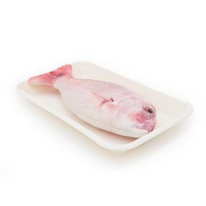 Catnip trout plush toy on white tray, pale pink fish with red tail