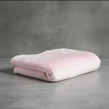 Folded light pink Shears double-fleece cat comfort blanket on a neutral grey background