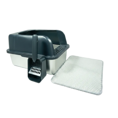 Pet litter box with scoop and additional litter on a white background