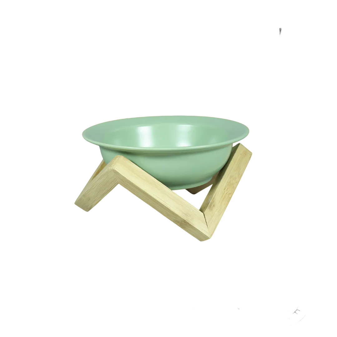 Raised ceramic bowl on a wooden stand - Omertà from The Apartment Cat