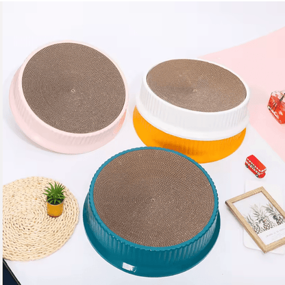 Round cat scratcher bed, gray top, on white, orange, and teal bases