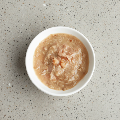 Tuna and shrimp goat milk wet cat food in a bowl